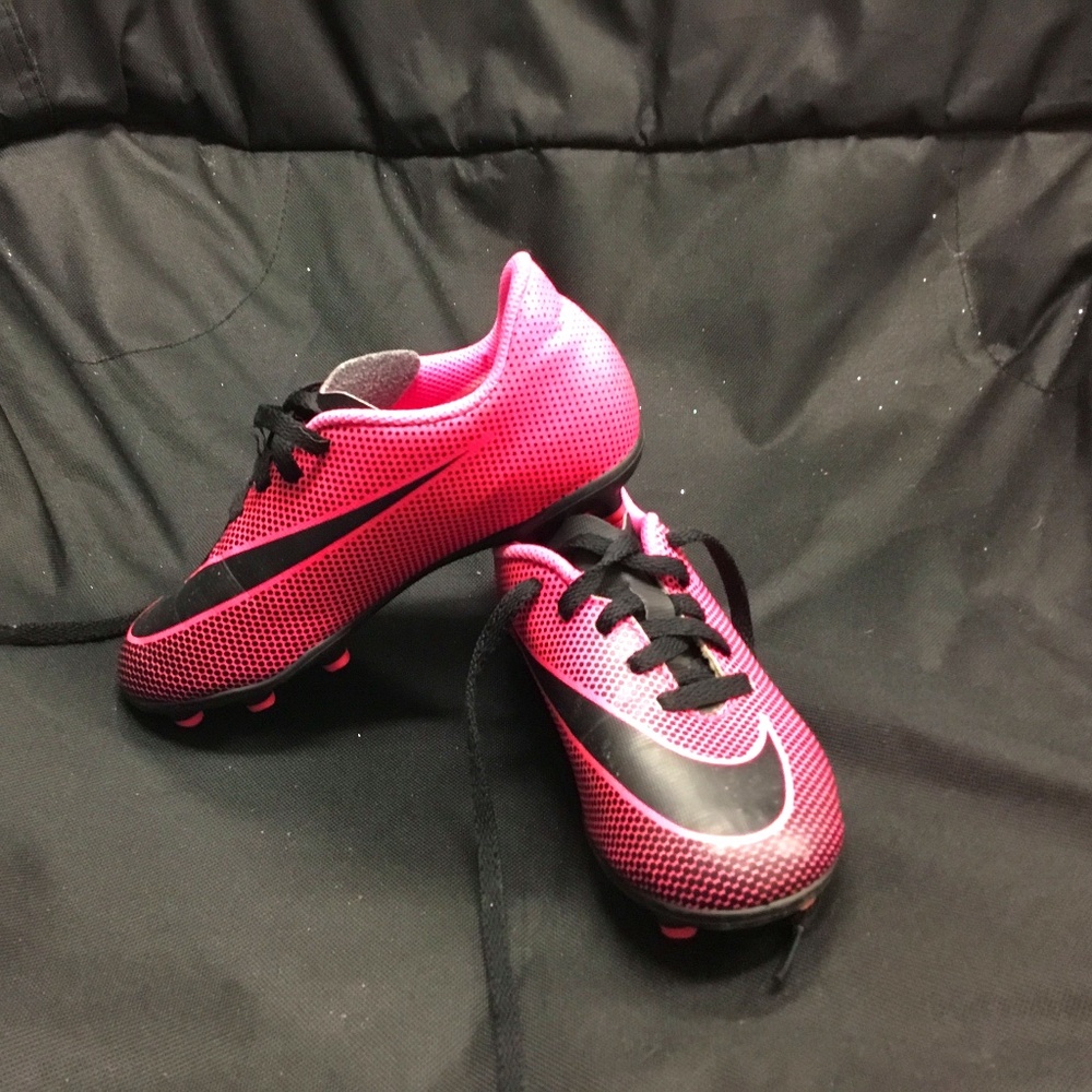 Nike pink and black kids cleats
